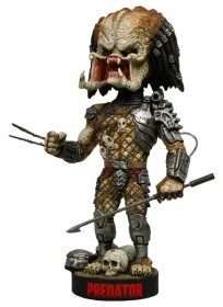 Predator Head Knocker Bobble-Head Predator with Spear 23 cm